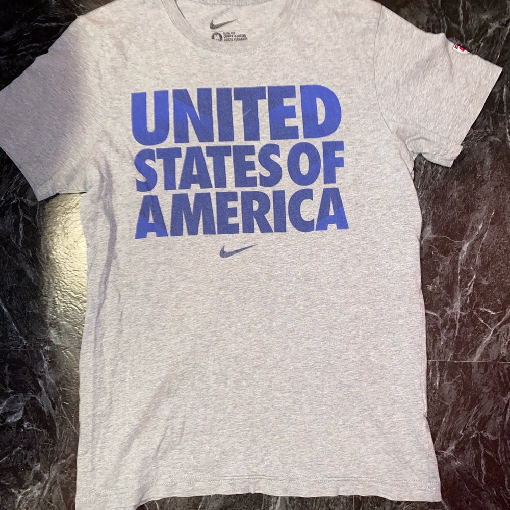 “United States Of America” Nike shirt.